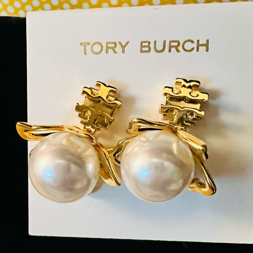 69. Tory Burch Gold and White Pearl Stud Earrings